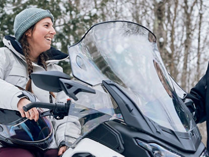couple chatting over the new Ski-Doo EV