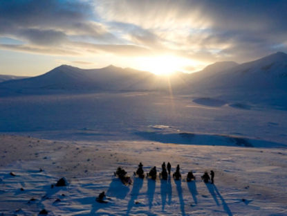 drone shot of a group overlooking Svalbard landscape
