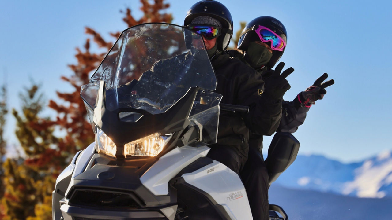 couple on a ski-doo ride