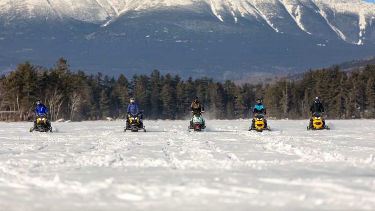 group of ski doo riders on a daytime ride