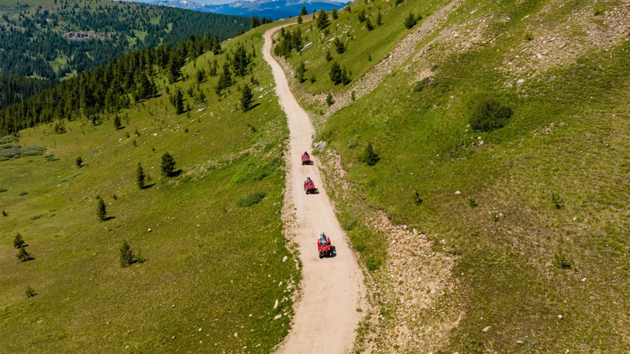 drone shot of Can-Am ATV road riding in Colorado