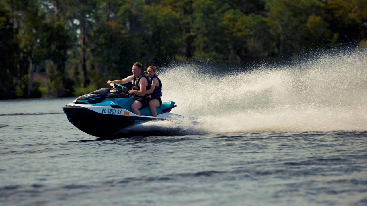 couples ride on a sea-doo