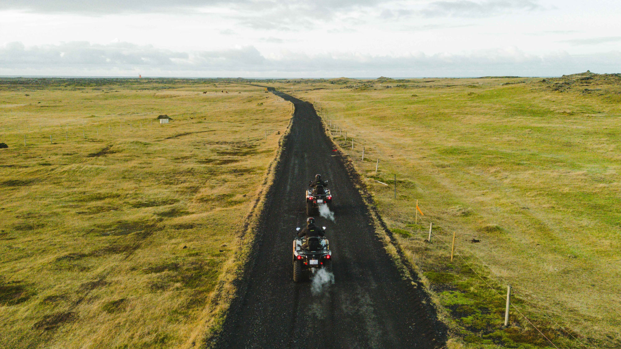 Two riders driving Can-Am ATVs in Iceland