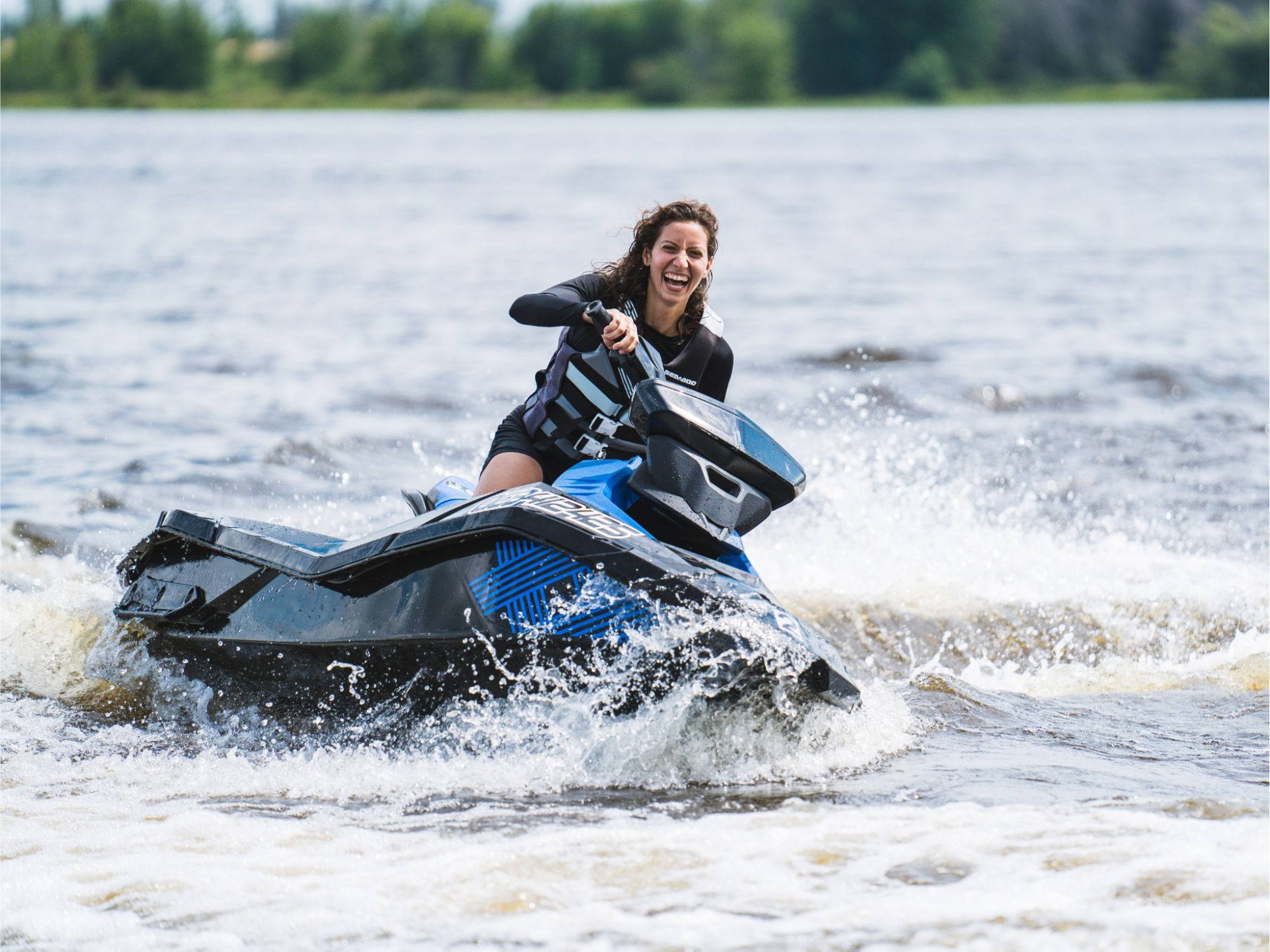 woman riding a Sea-Doo at the BRP Experience Center