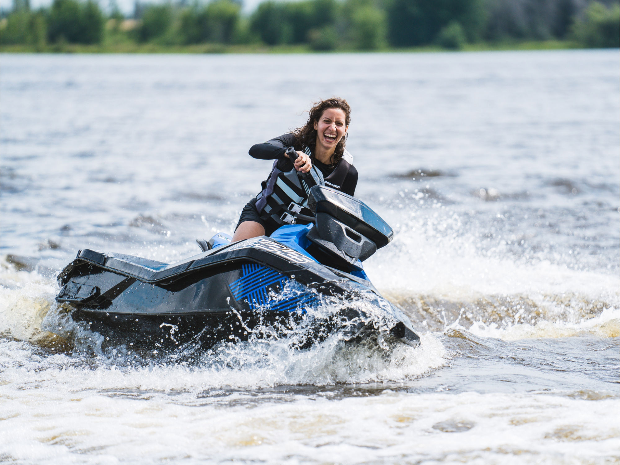 Woman riding a Sea-Doo at the BRP Experience Center